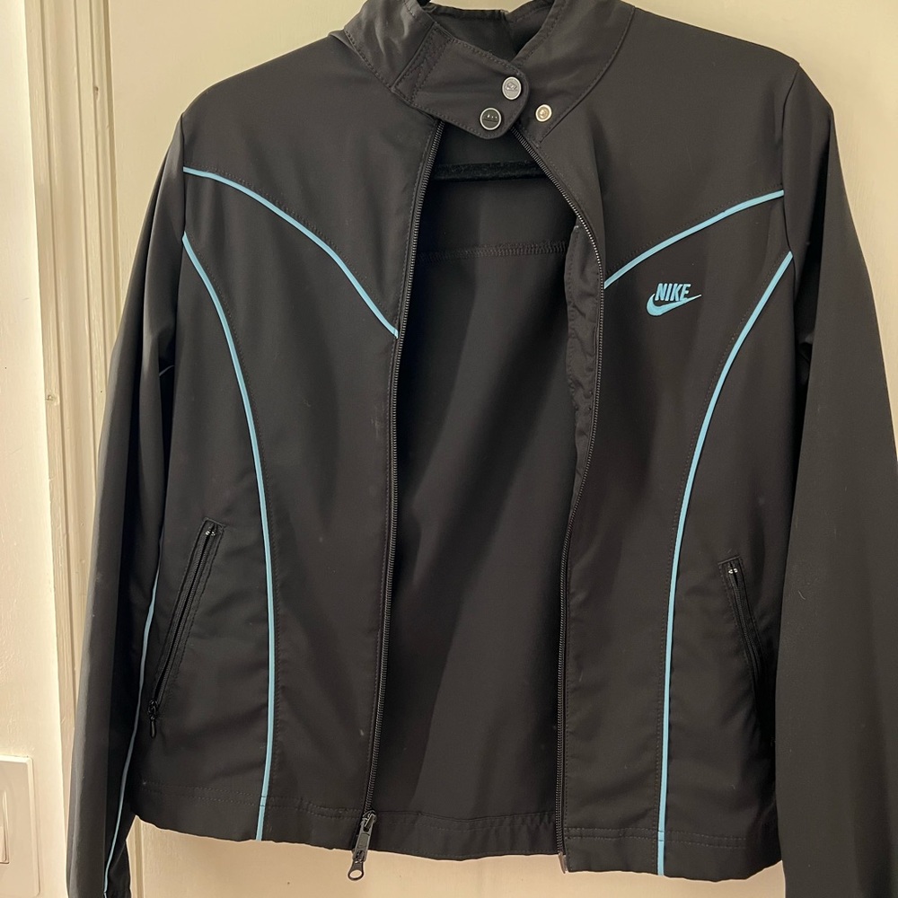 Vintage Nike Sportswear jacket with aqua blue lining